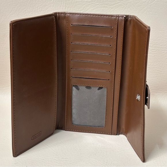Coach Women's Brown
Signature Checkbook Wallet
Canvas & Leather Tri-Fold - Picture 4 of 6